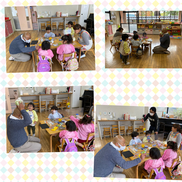 にわとりさんのキャベツを頭にのっけている園長先生ww